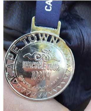 The medal — Turning the Wheels on Dystonia